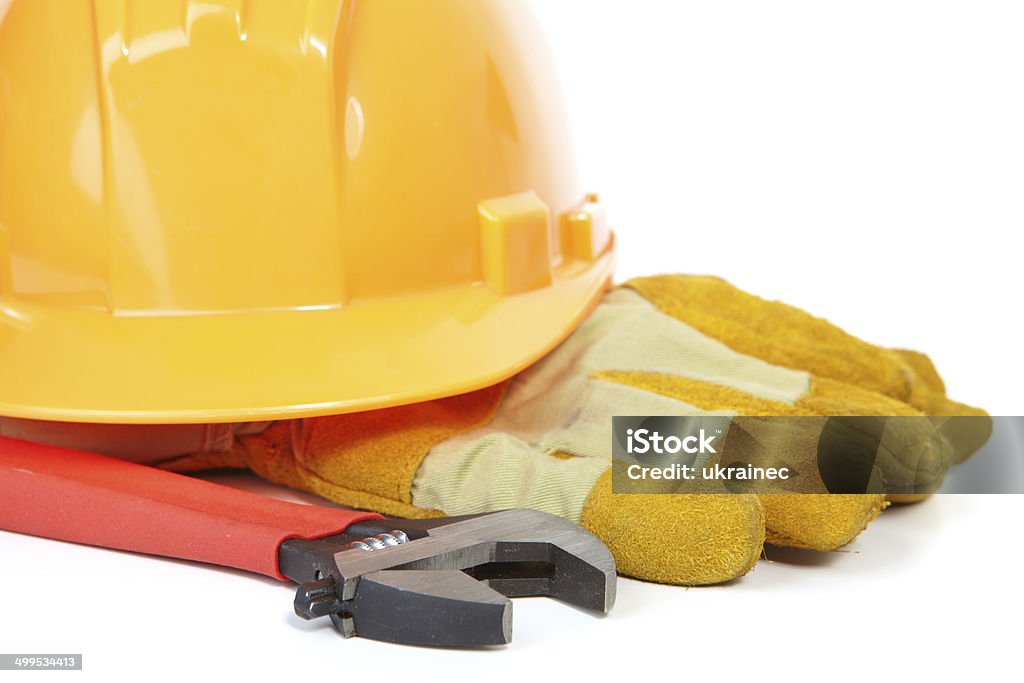 Helm und Schraubenschlüssel und grobe Leder Handschuhe - Lizenzfrei Ausrüstung und Geräte Stock-Foto