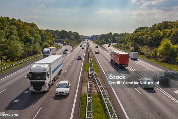 Evening Traffic On The A12 Motorway Stock Photo - Download Image Now - Transportation, Truck, Multiple Lane Highway