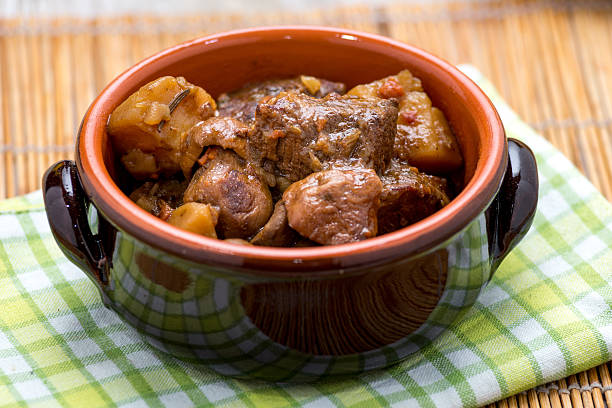 istock stew with potatoes in a terracotta bowl 499535963