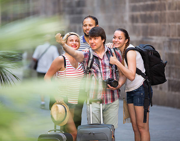 istock Young travelers doing selfie 499536704