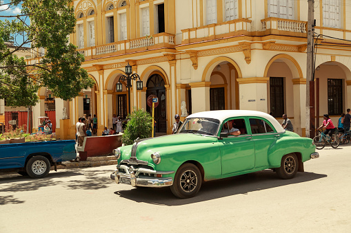 Moron, Cuba, Cayo Coco island July 23, 2013 beautiful vintage car driving in Cuban town of Moron