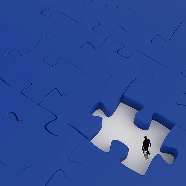 istock businessman walking in Missing 3d puzzle piece as concept 499537565