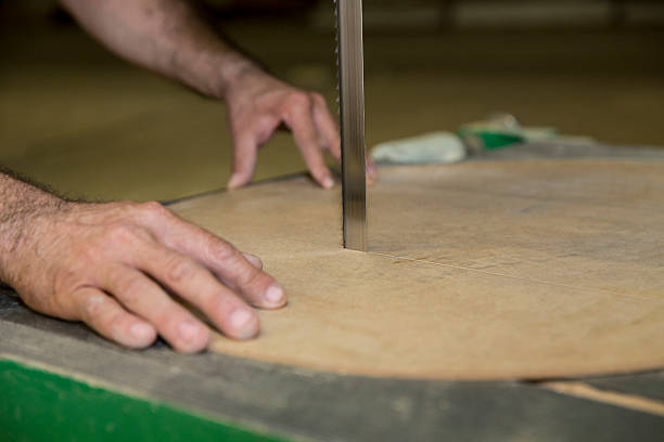 istock Cutting A Wood With Vertical Electric Saw 499538365