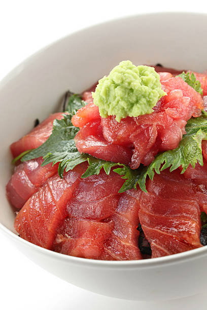 japanese tuna rice bowl japanese tuna rice bowl, vinegared rice topped with sliced raw tuna toro zamora stock pictures, royalty-free photos & images