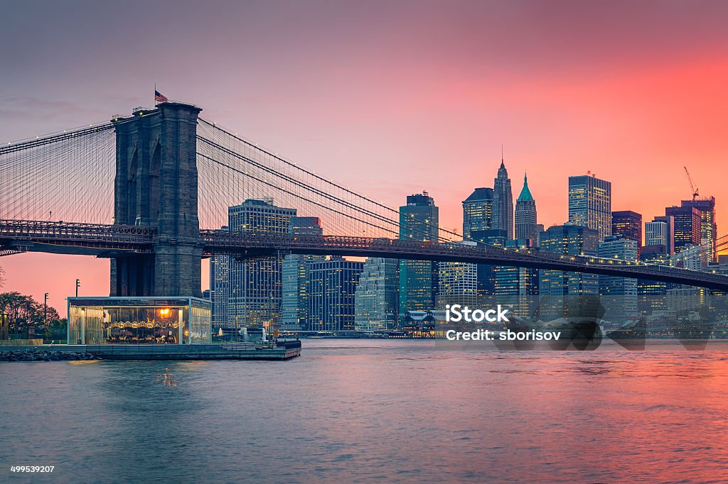 Brooklyn bridge and Manhattan at dusk Brooklyn bridge at dusk, New York City Architecture Stock Photo