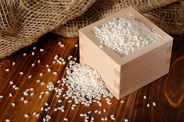 Mochi rice ( Glutinous Rice ) is a variety of Japanese rice used in rice cakes, sweets and other Japanese dishes. ( shallow DOF, rustic style )