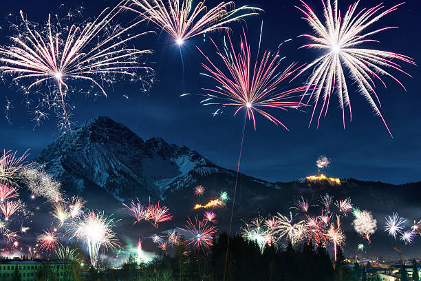 istock New Year's Eve firework display in austrian mountain alps 499539572