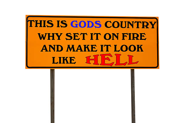Orange sign that says, this is God's county.