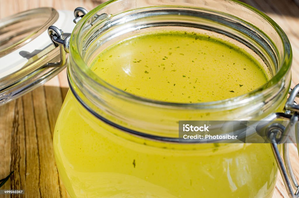 Canned broth, bouillon, clear soup Canned broth, bouillon, clear soup in a glass jar Chicken Meat Stock Photo