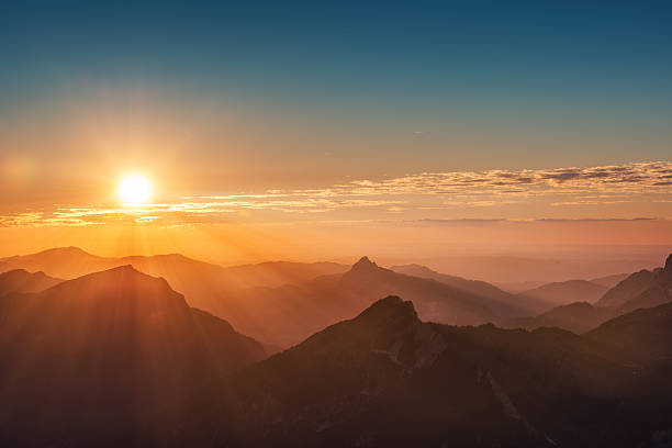 istock colorful sunset on top of austrian mountain alps 499540452