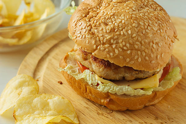istock Cheeseburger on wooden plate 499544776
