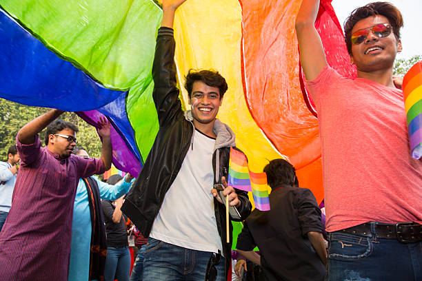 Delhi Queer Pride -2015 New Delhi, India - November 29, 2015: Delhi Queer Pride -2015 indian couple kiss stock pictures, royalty-free photos & images