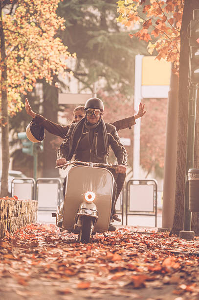 istock Vintage Couple with Scooter in Italy 499546830