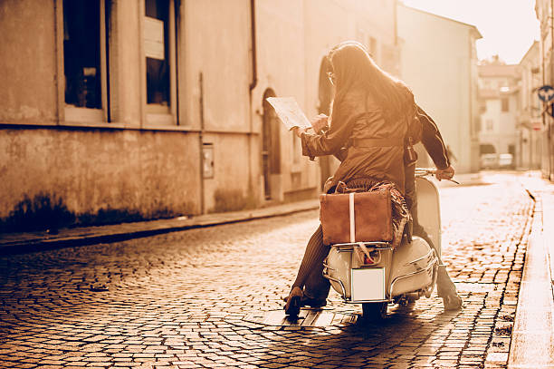 istock Vintage Couple with Scooter in Italy 499548844