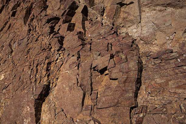 istock cracked stone texture closeup - rock crack 499549560