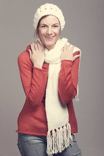 istock Attractive smiling woman in winter clothes 499554527