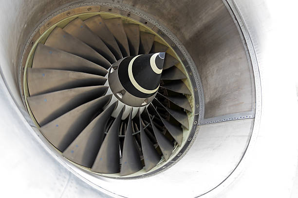 istock Close-up of a jet engine with slowly moving blades 499555183
