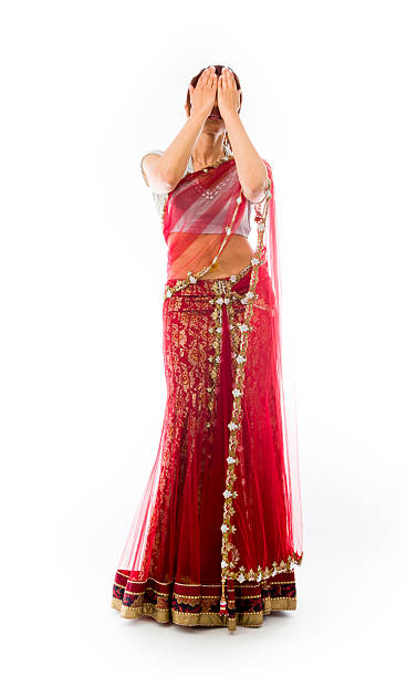 istock Young Indian woman covering her face with her hands 499556065