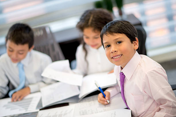 istock Kids in a business meeting 499564731