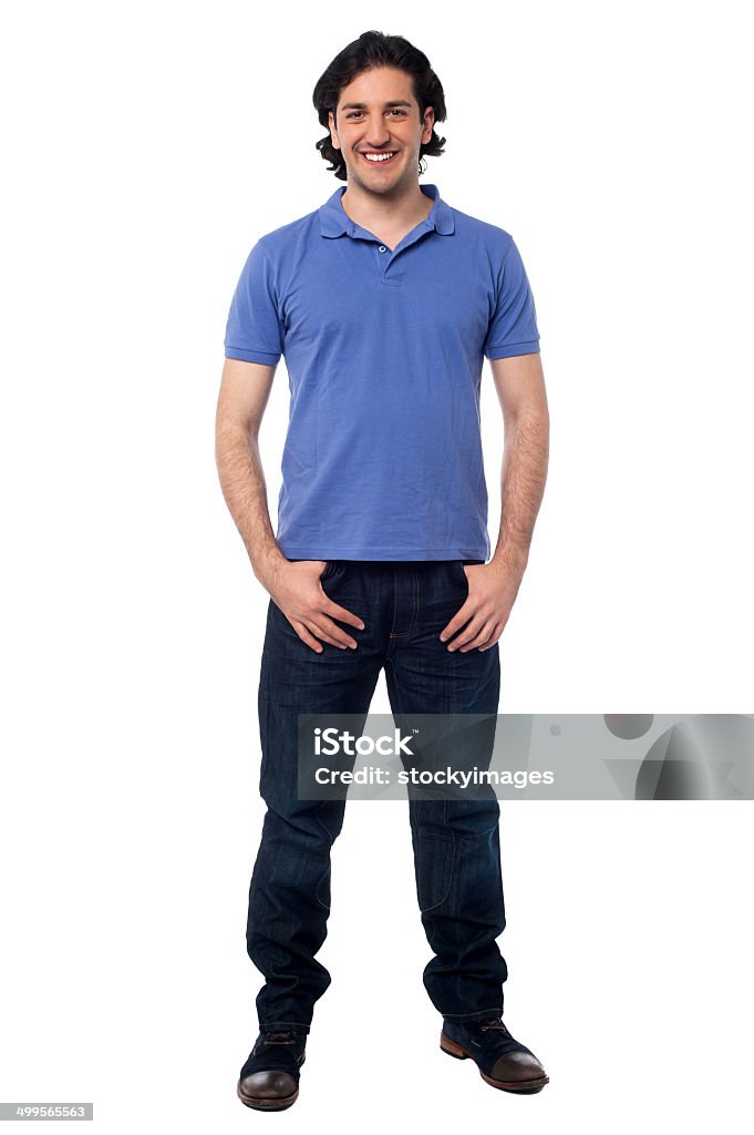 Casual studio shot of a cheerful young man Young man posing casually, full length portrait Adults Only Stock Photo
