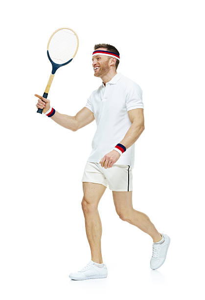 istock Cheerful tennis player walking 499565675