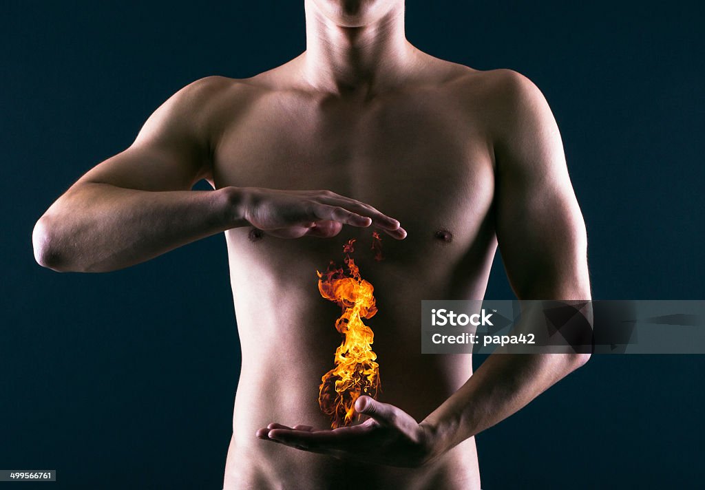 Heartburn. Pain in the abdomen or in the stomach of man. Abdomen Stock Photo