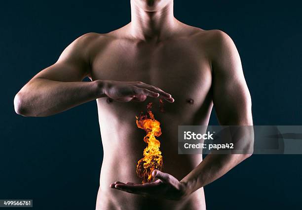 Heartburn Stock Photo - Download Image Now - Abdomen, Fire - Natural Phenomenon, Human Abdomen