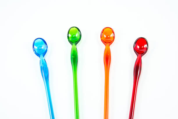 istock Color spoons isolated on white background 499567083