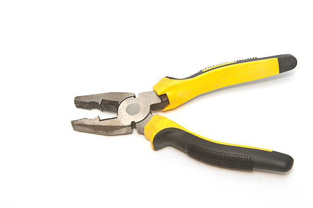 istock old pliers yellow and black color 499568205
