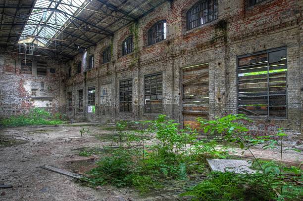 istock Large old abandoned factory building 499568655