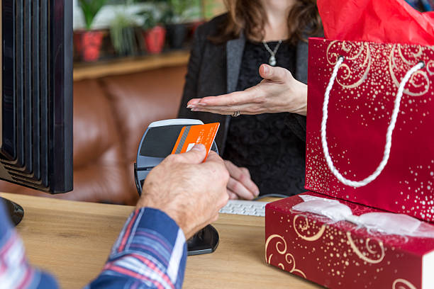 istock Man Paying With NFC Technology on Credit Card in Store 499569570