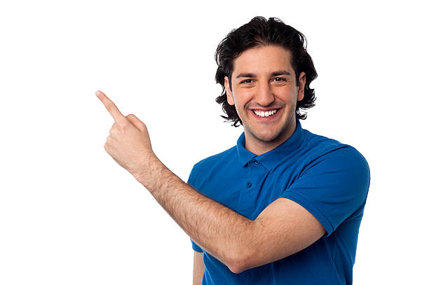 istock Handsome young male pointing at something 499569913