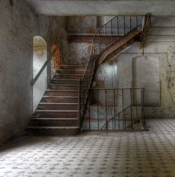 istock Old staircase in an abandoned building 499570193