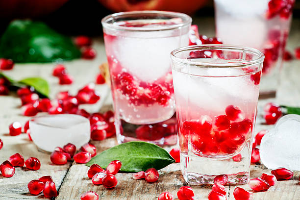 istock Fresh sparkling water with ice and pomegranate 499570294