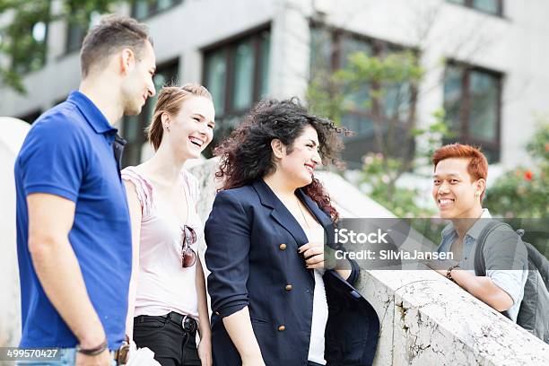 Young Adults Friends Meeting In Town Stock Photo - Download Image Now - 16-17 Years, 20-24 Years, 20-29 Years