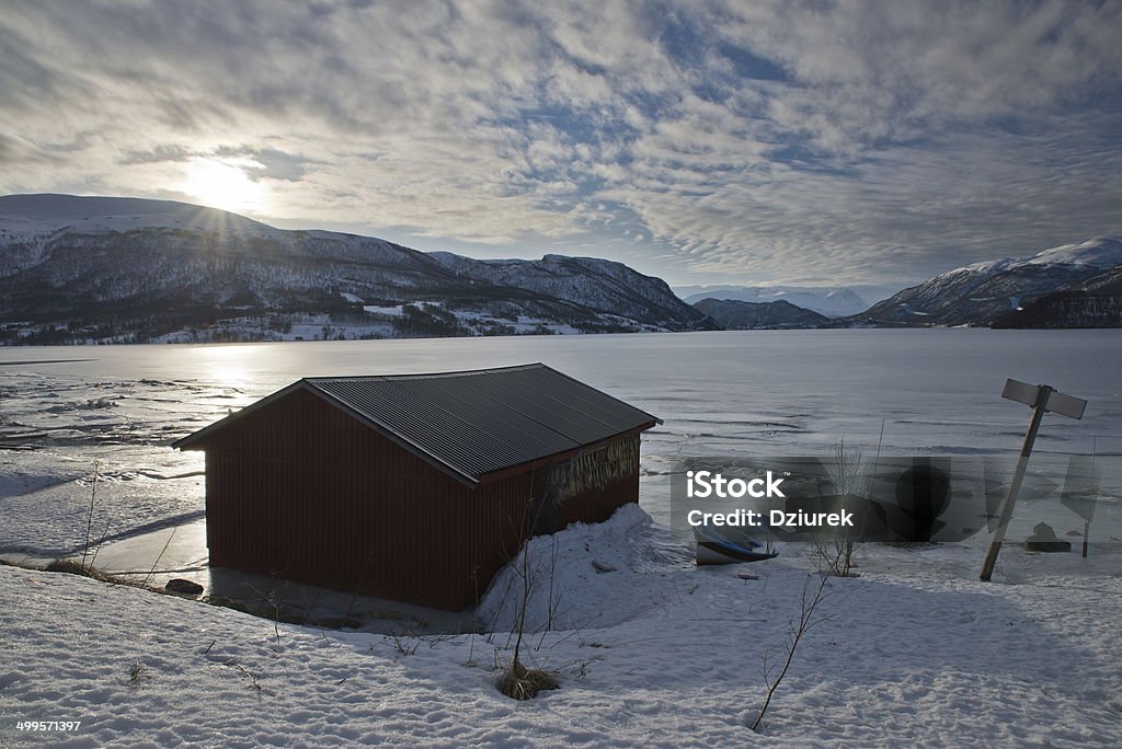 Shed with fish. Shed with fish on the shore of the fjord Arctic Stock Photo