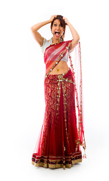 istock Young Indian woman pulling her hair and screaming in frustration 499571419