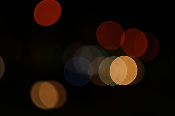 istock abstact blur bokeh Evening traffic jam on road in city. 499571816
