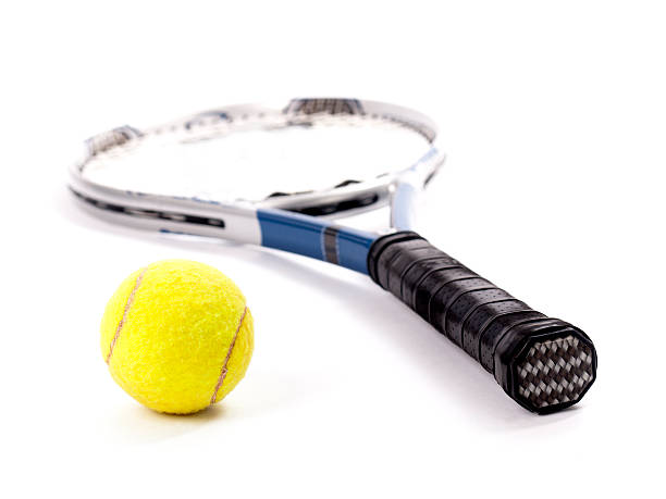 istock Yellow tennis ball and racket isolated on a white background 499571823