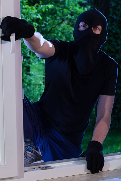 istock Burglar enters the house 499572005