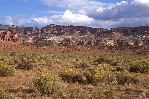 istock Red white rock outcrops cliffs desert winter near Boulder Utah 499572176