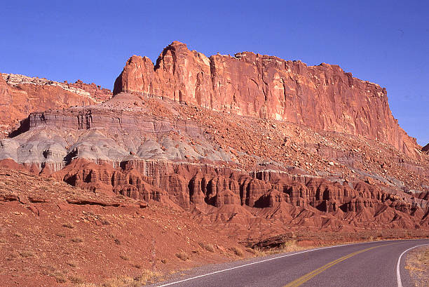 istock Sandstone cliffs highway Capitol Reef National Park near Torrey Utah 499572292