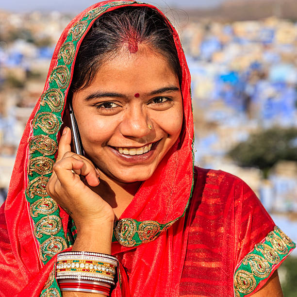 istock Young Indian woman using mobile phone, Jodhpur, India 499577188