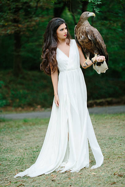 istock Beautiful girl and her eagle 499577498