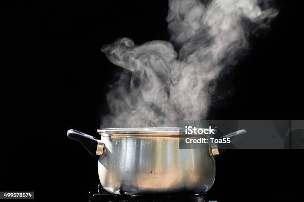 Steam Over Cooking Pot Stock Photo - Download Image Now - Cooking Pan, Steam, Stove