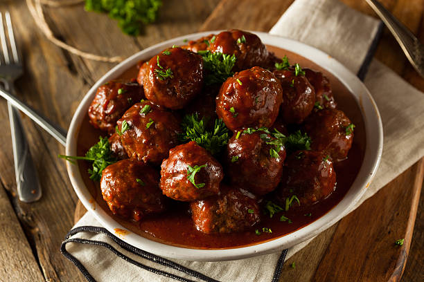 Homemade Barbecue Meat Balls Homemade Barbecue Meat Balls with Red Sauce barbeque sauce photos stock pictures, royalty-free photos & images