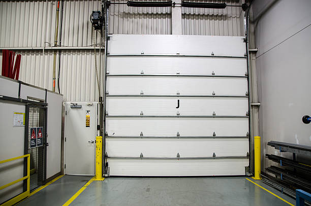 istock Garage door in a warehouse 499579054