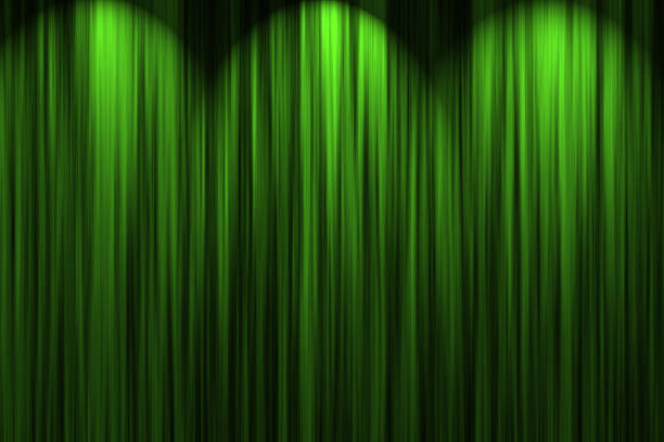 Green stage curtain with spot lights