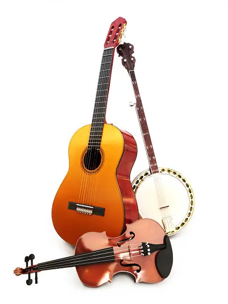 Photo of Stringed music instruments Guitar, banjo, violin on a white background.