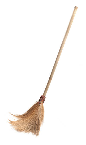 istock Old straw broomstick ready fly or sweep isolated 499579960